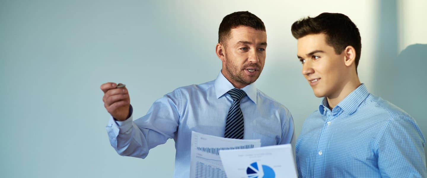 Accountant collaborating with business clients on financial planning and commercial funding options