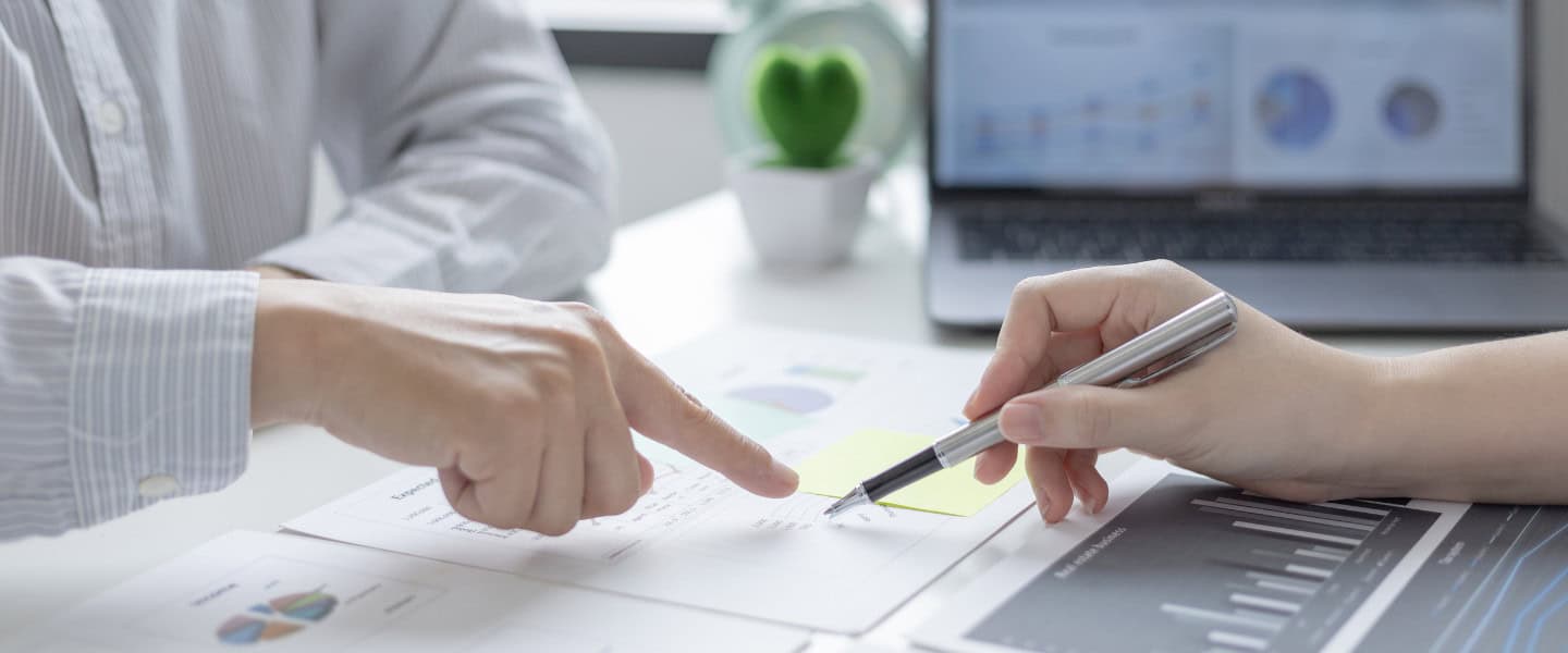 Broker reviewing commercial loan documents