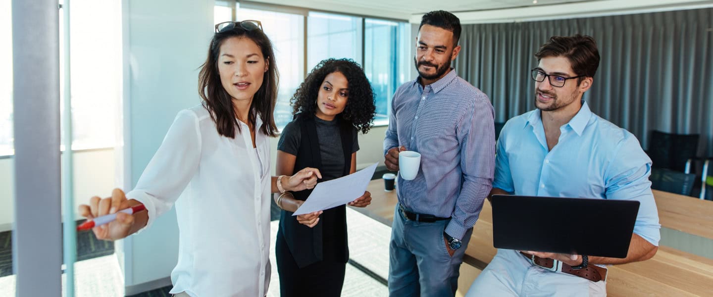 Team meeting focused on adding commercial lending services to a mortgage business