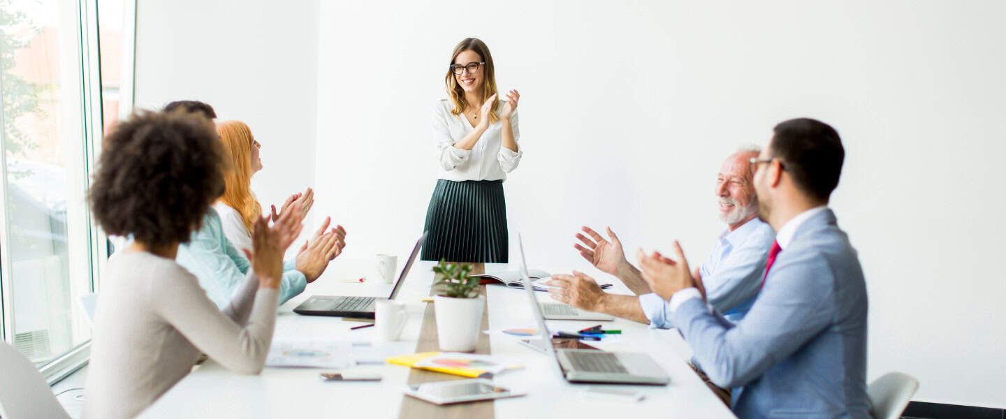 Commercial loan brokers reviewing deal documents